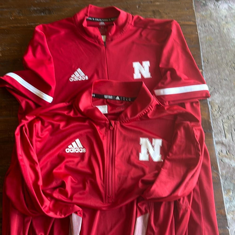 2 Nebraska Huskers light weight shirts.